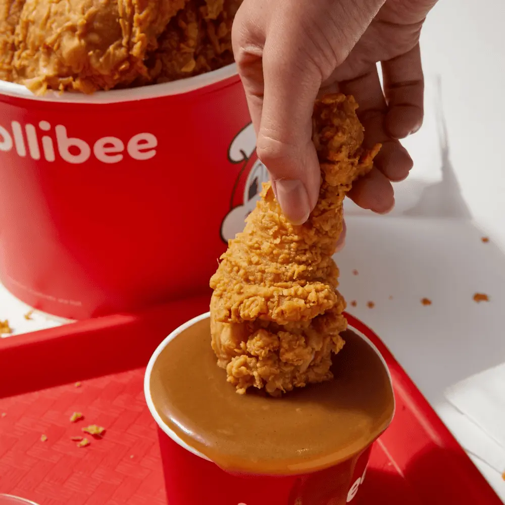 Jollibee Chickenjoy dipped in gravy